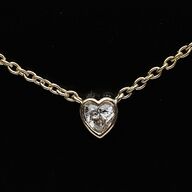 Halskæde af 14 kt. guld med brillantslebene laboratorieskabte diamant på samlet ca. 0.10 ct