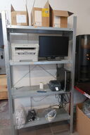 Reol med labelprinter ZEBRA GK 420d, computer HP, printer BROTHER m.m.