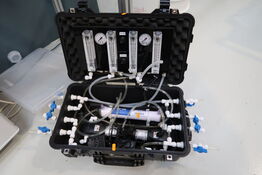 Kuffert med testapparat