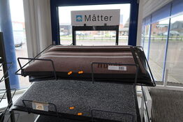 Hylde med dørmåtter