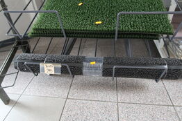 Hylde med dørmåtter