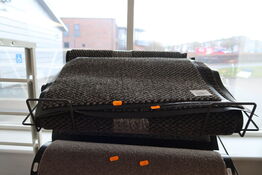 Hylde med dørmåtter