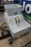 Slibemaskine til brilleglas