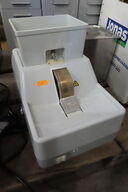 Slibemaskine til brilleglas