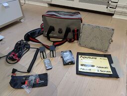 Amaran LED Tri-8C light kit, including panel, batteries, mounting gear, and carrying bag - APUTURE