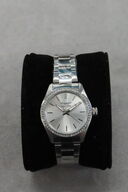 Sector Dameur med Sølvfarvet Skive og Metalrem