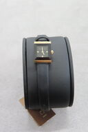 Gucci Kvartshåndledsur med Sort Læderrem og Guldtonet Ramme