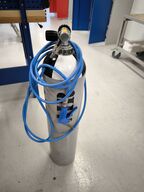 Iltflaske med slange og pistol