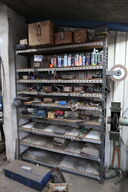 Reol med div. Reservedele, værktøj m.m.