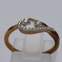 "Tidløse guldsmykker - Ringe i hvidguld og guld med naturlige diamanter og ferskvandsperler"