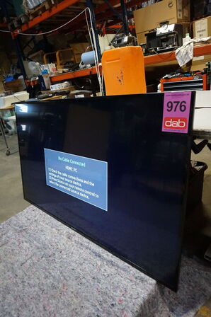 Samsung 65" fladskærm/monitor (MOMSFRI)