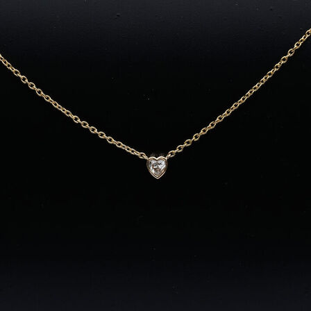 Halskæde af 14 kt. guld med brillantslebene laboratorieskabte diamant på samlet ca. 0.10 ct