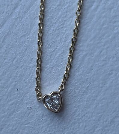 Halskæde af 14 kt. guld med brillantslebene laboratorieskabte diamant på samlet ca. 0.10 ct