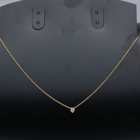 Halskæde af 14 kt. guld med brillantslebene laboratorieskabte diamant på samlet ca. 0.10 ct