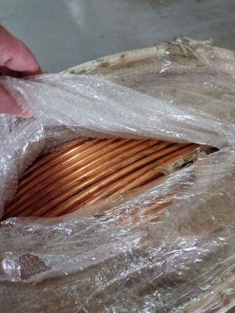 Stor tromle med kobberrør. Mange kg.