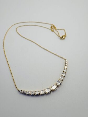 Klassiske smykker, solitaire ringe, halskæder med diamanter og tennisarmbånd i 14 kt guld