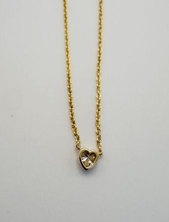 Halskæde af 14 kt. guld med brillantslebene laboratorieskabte diamant på samlet ca. 0.10 ct