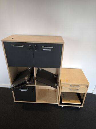Skuffemodul samt skab 