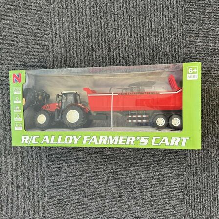 Radiostyret traktor med tipvogn rød