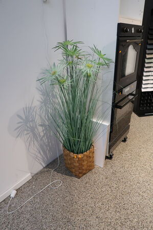 Kunstig plante i krukke