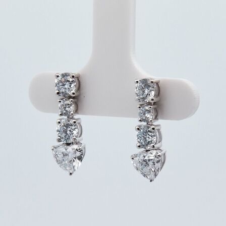 3,09 ct. laboratorieskabt diamantørestikker i 14kt