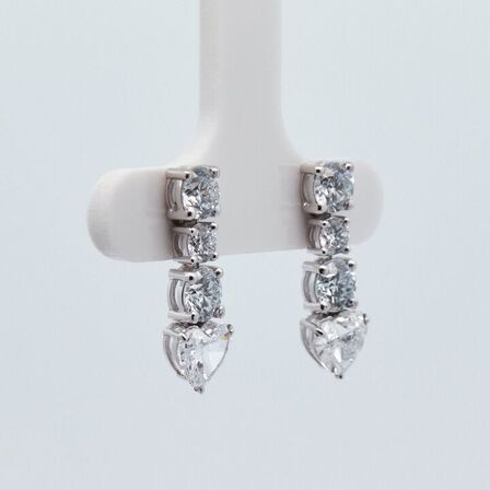 3,09 ct. laboratorieskabt diamantørestikker i 14kt