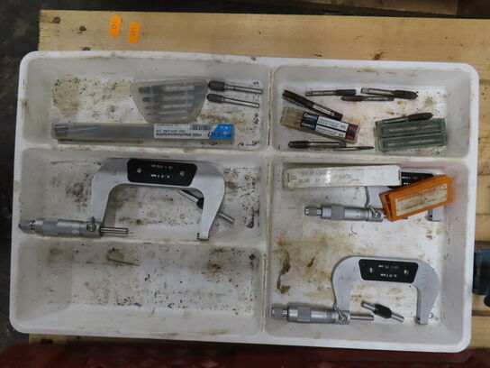 Indholdet på pallen