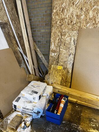 Wood, concrete bags and pipes