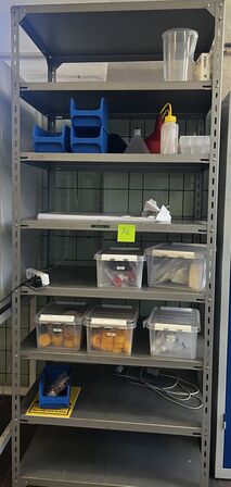 Shelf unit with various laboratory items