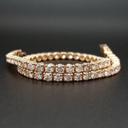Armbånd 4,45 ct. Naturlige PINK diamanter i 14kt rosa guld. AIG