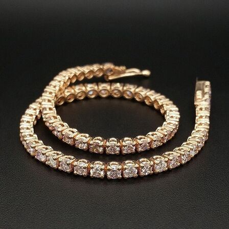 Armbånd 4,45 ct. Naturlige PINK diamanter i 14kt rosa guld. AIG