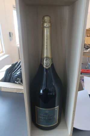 Champagne og designtasker