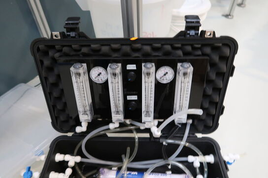 Kuffert med testapparat