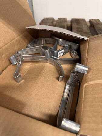 Kasse med 25 stk konsoljern 