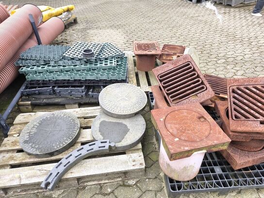 Parti med kloarkriste og brønddæksler