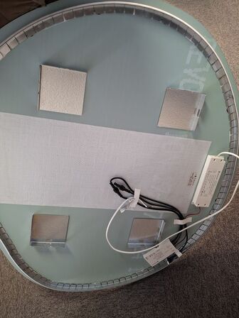 Rundt, stilrent minimalistisk spejl  STRØMBERG