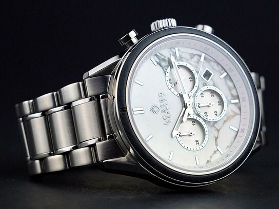 Herreur med marmor urskive.