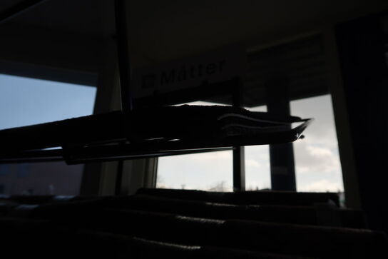 Hylde med dørmåtter