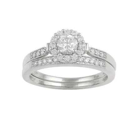 14 kt hvidguld ringe (2 stk) med samlet 32 naturlige diamanter, 0,63 carat