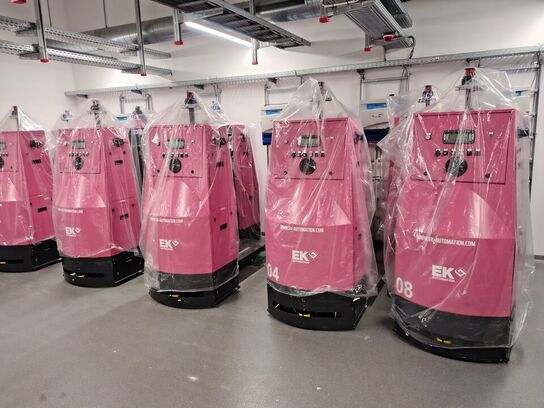 Eleven Transport Robots and six chargers E&K AUTOMATION ECO L03