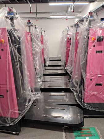 Eleven Transport Robots and six chargers E&K AUTOMATION ECO L03