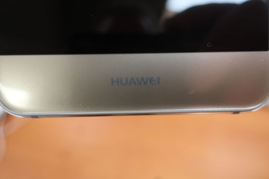 Mobiltelefon, HUAWEI m. lader