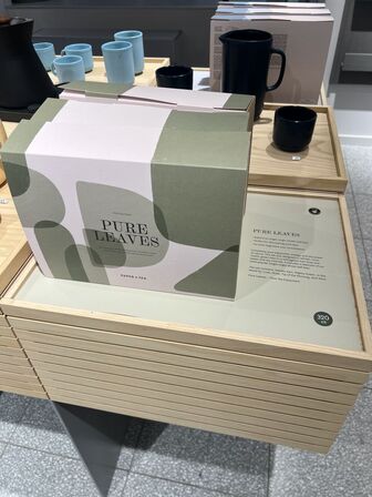 Displaystand m. løse plader inkl. indhold