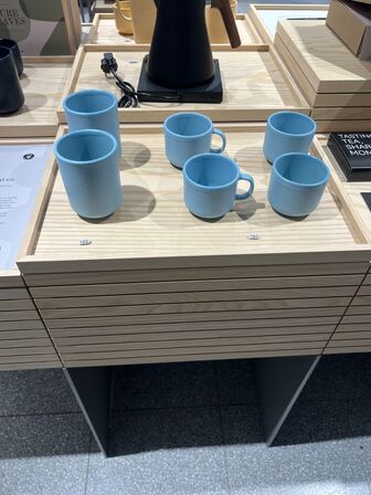 Displaystand m. løse plader inkl. indhold