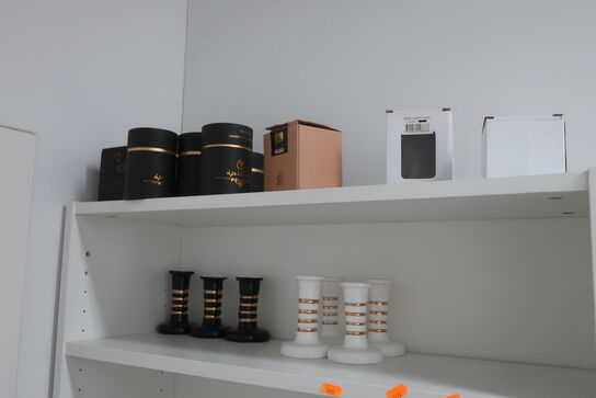 Vandpibehoveder på reol 