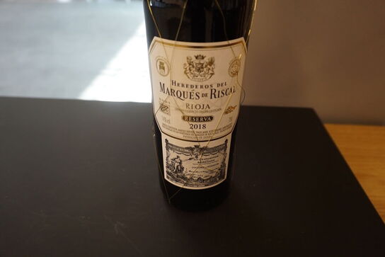 7 flasker blandet vin