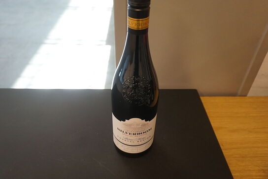 7 flasker blandet vin