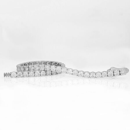 "Klassiske tennis armbånd -i hvidguld med naturlige diamanter, og guld tennis armbånd med lab- grown diamanter "