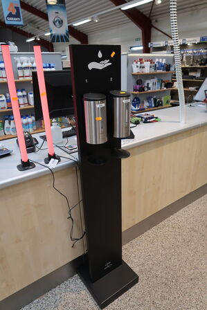 Spritdispenser på stativ